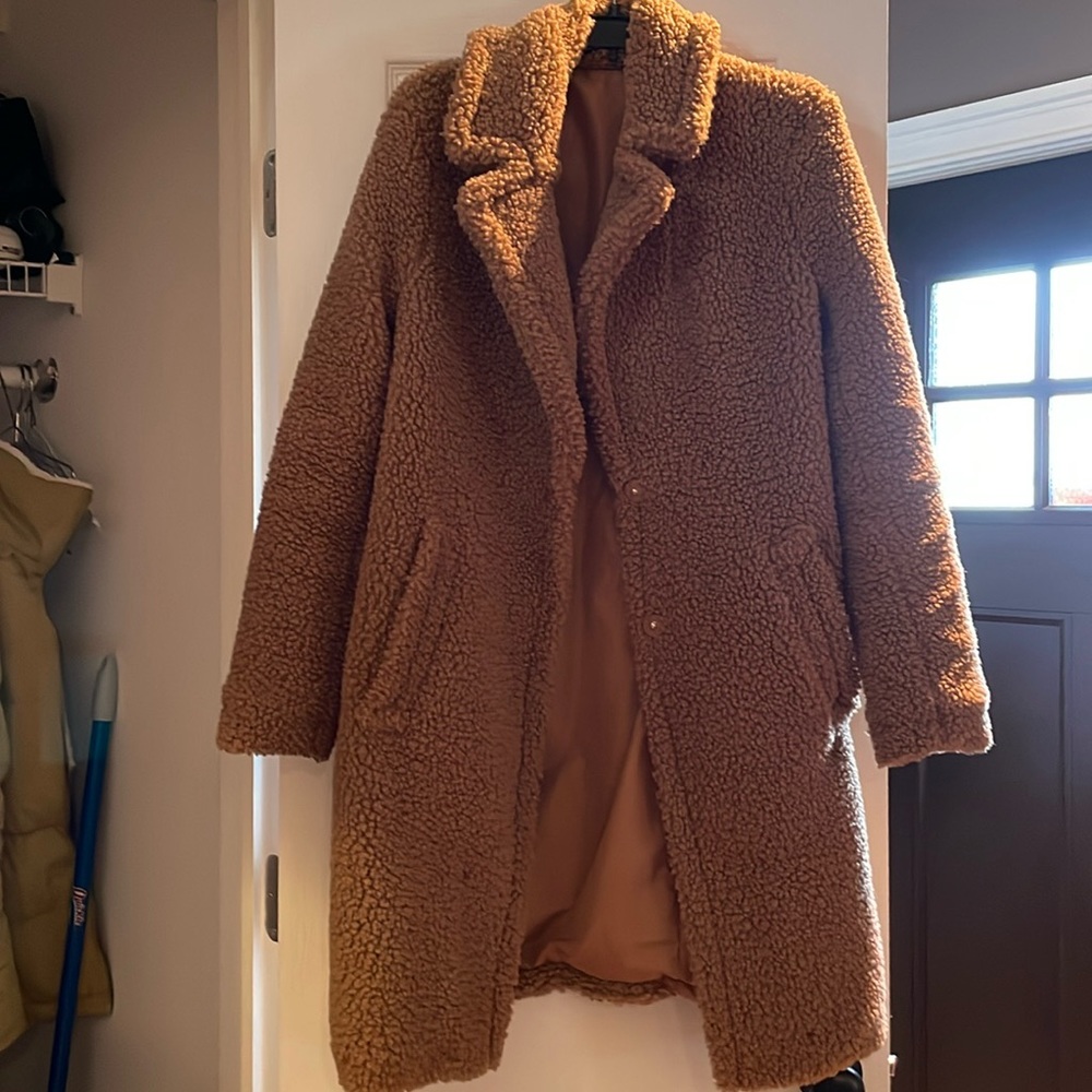Reversible brown teddy coat with two snap buttons